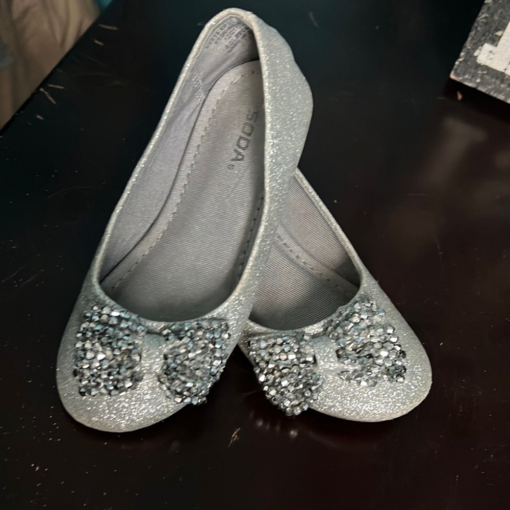 Silver ballet flats with stoned bow
